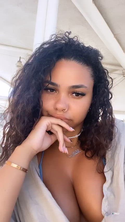 cleavage curly hair lightskinned gif