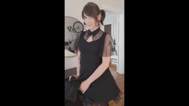 Teasing in a cute gothic dress
