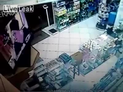 Convenience store cashier shoots robbers