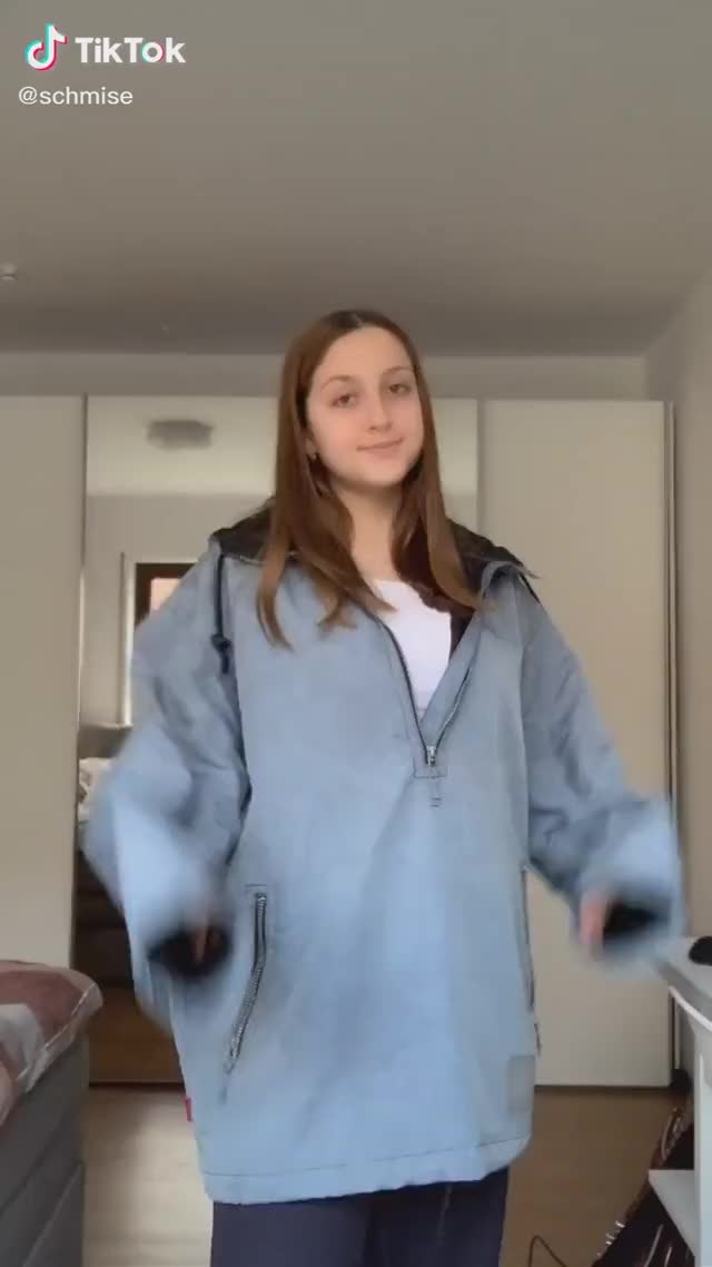 ticktock thot in an oversized sweatshirt