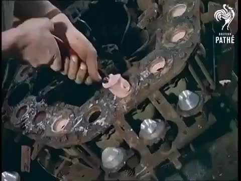 Doll making factory assembly line, 1963, from British Pathe TV.