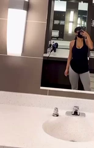 busty gym mirror gif