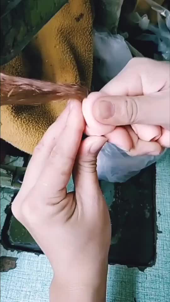 Sewing hair on a dolls head