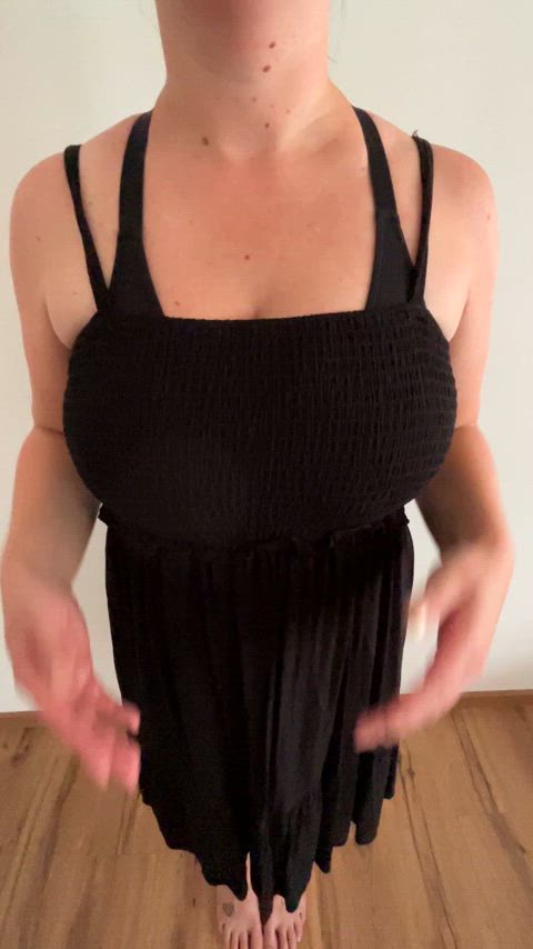 Black lingerie under black dress