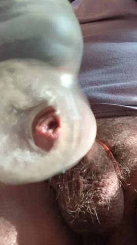 Extreme closeup of my uncut cock inside my Hitachi cock sleeve