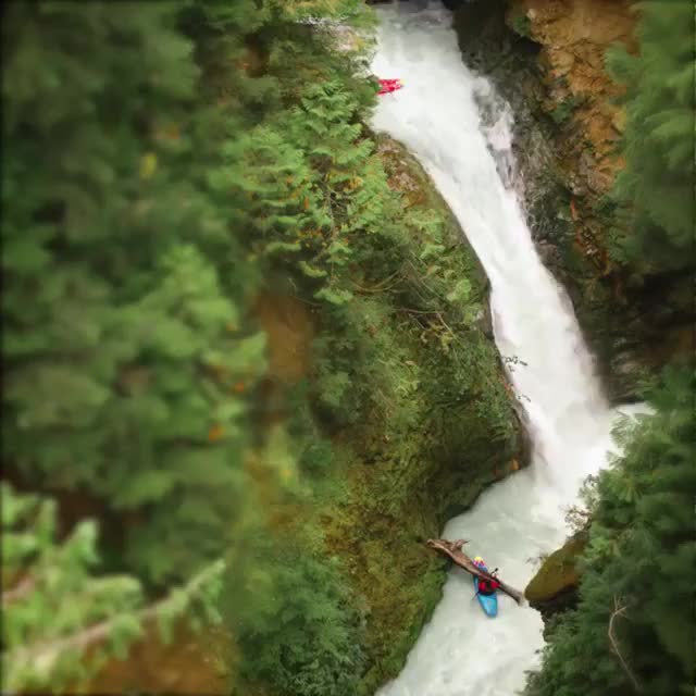 Real-life toys kayak in a stream