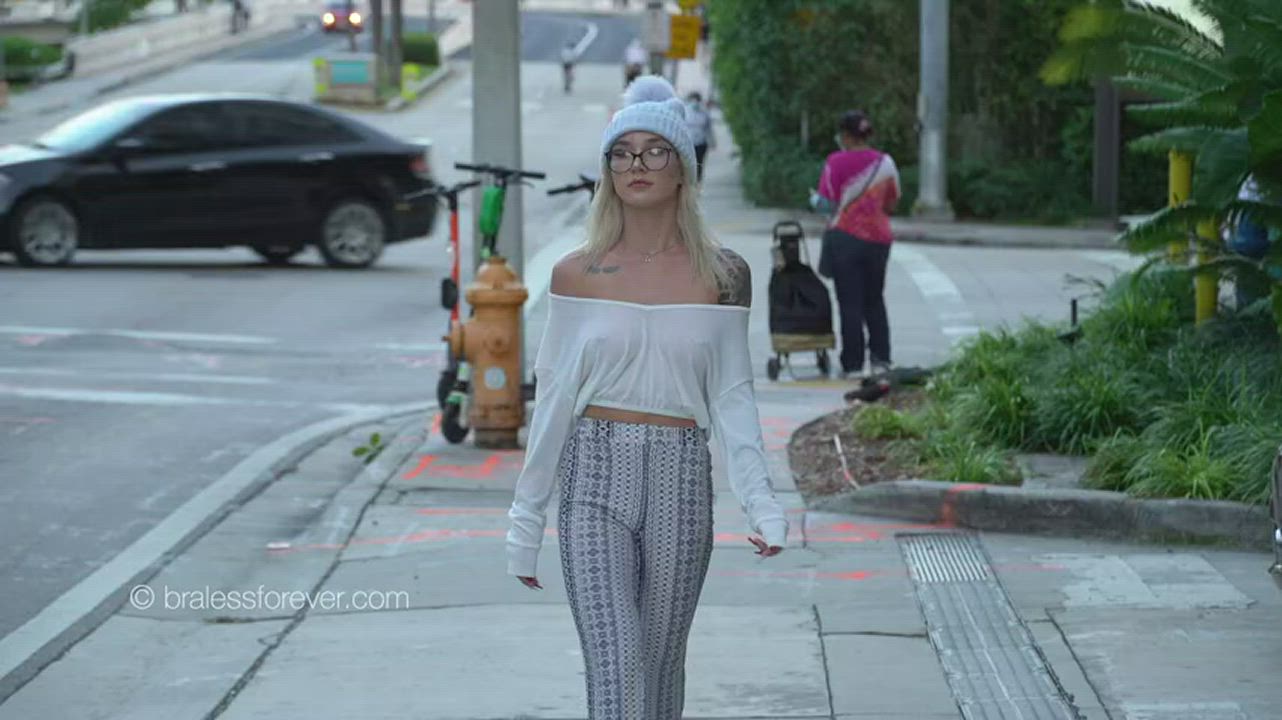 Blonde walking the streets braless