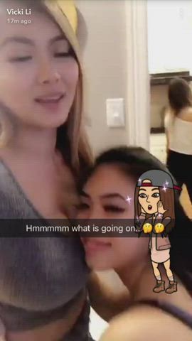 Vicki Li getting motorboated by her friend