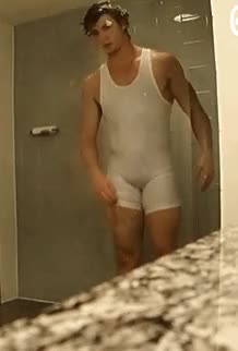 Shower in white singlet ...