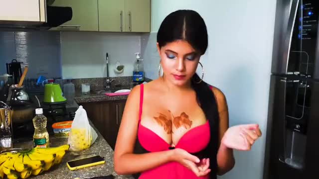 Marta licks chocolate off her tits