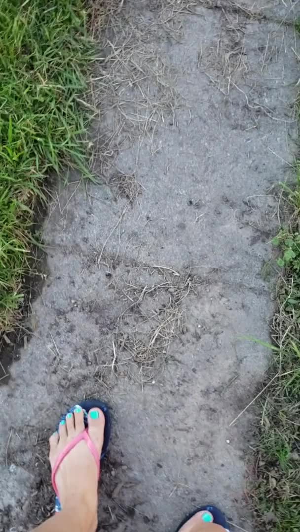 Girl Pees While Walking Down Public Sidewalk