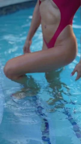 ass big tits oil oiled swimsuit tanned thong tits gif