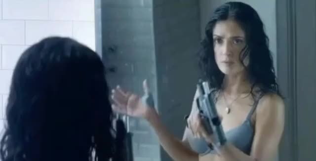 Selma Hayek locked and loaded