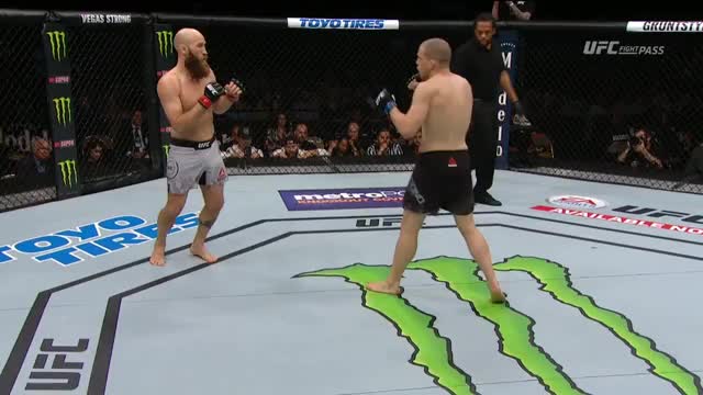 Alex Morono	wobbles Josh Burkman and then guillotines him! NICE!