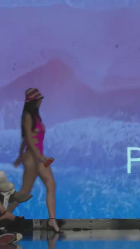 jiggling model swimsuit walking gif