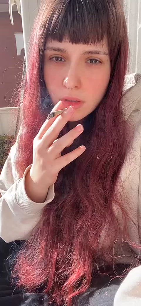 Cutie smoking just for you