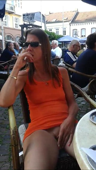 Milf Rubbing her Clit in a Public Cafe