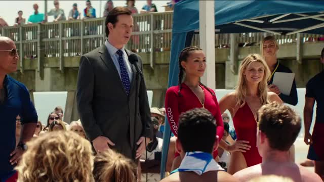Kelly Rohrbach - Baywatch - on stage (red swimsuit) with other lifeguards to give