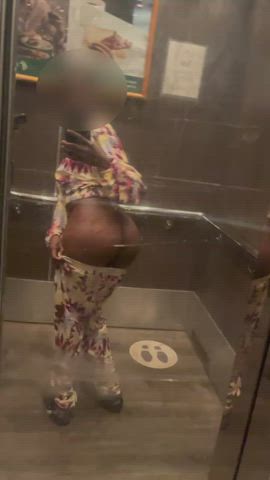 ass couple elevator flashing gif