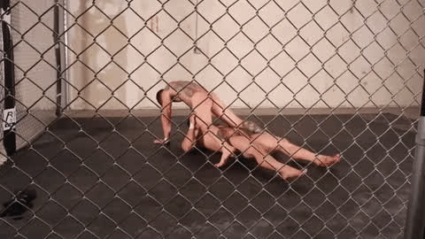 caged gay naked wrestling massive-cock gif