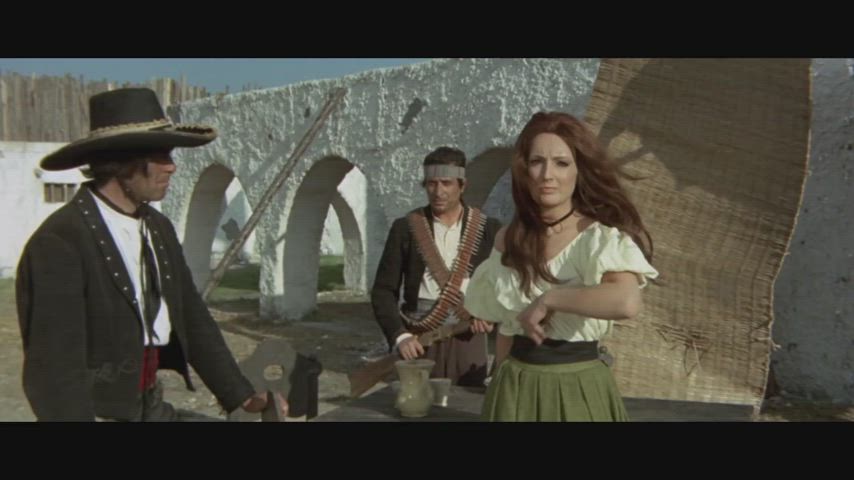 Marina Rabissi stripped by whip in Gunman of One Hundred Crosses (1971)