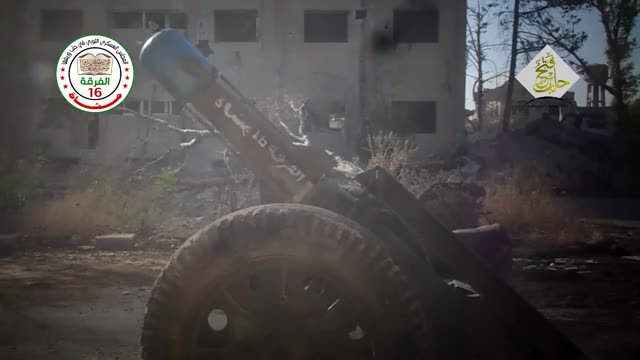 FSA "Hell Cannon" drops a round on a SAA position