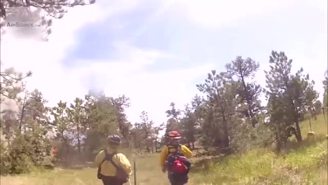 First-Person POV - Firefighters battle with Forest Fire