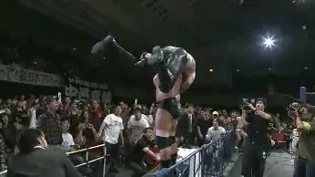 Shinsuke Nakamura takes a F5 on the barricade