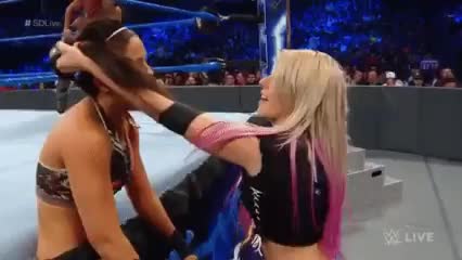 Alexa Bliss doing Bayley a favor and fixing her hair!