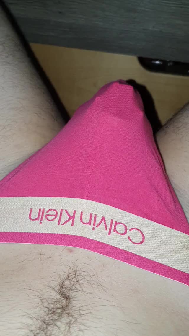 Locked Twink in pink CK Jockstrap plays with a Fisting Plug