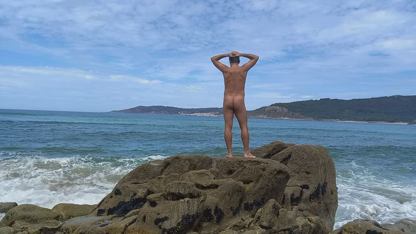 Enjoying the waves. Nudist splash