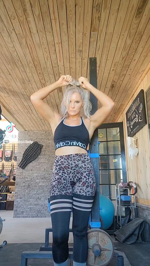 blonde cleavage spandex yoga pants gif