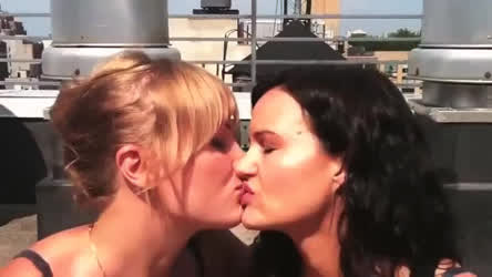 Malin Akerman making out with her Watchmen mother, Carla Gugino