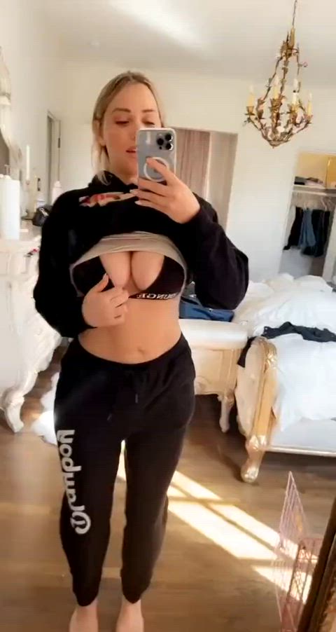 Showing her tits