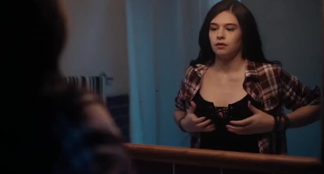 Nicole Maines - Adjusting her boobs!