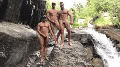 Playing with their cocks at waterfall ...