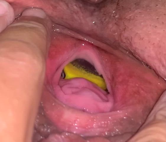 Close up peeing with something in my pussy.