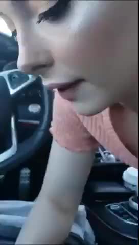 Gorgeous babe sucking dick in car