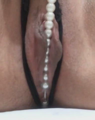 Her pearl thong makes her pussy drool [GIF]