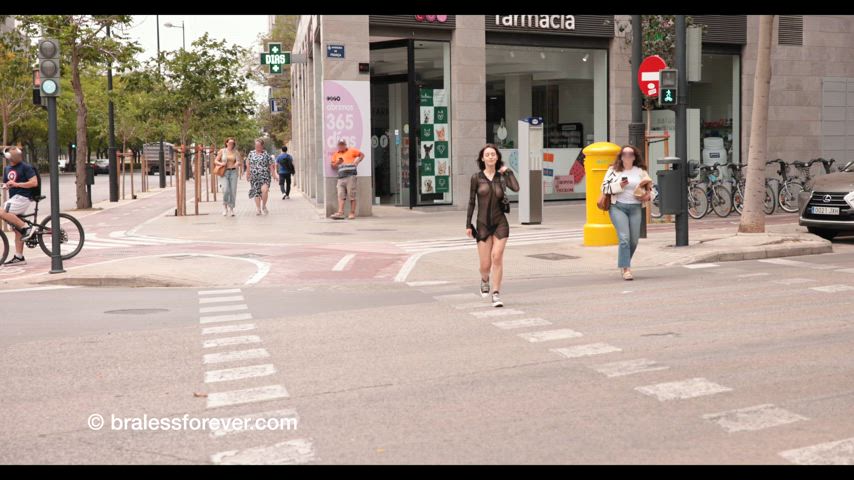 New model Elfa walks around the city in a sheer dress 😍