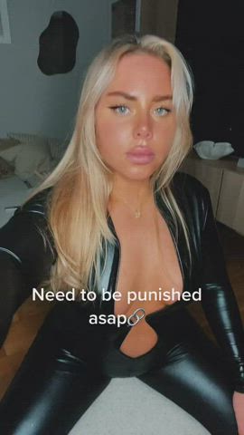 blonde femdom leather gif