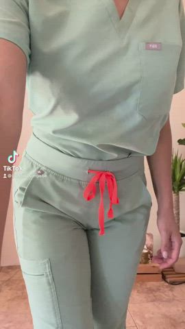 Wanna see what’s under my scrubs?