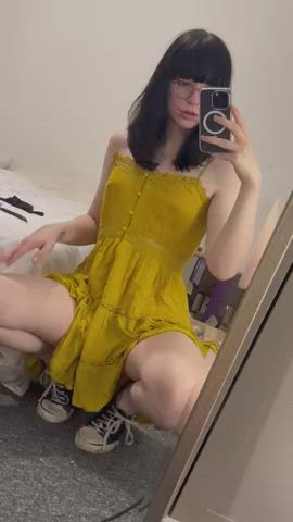 Cute girl with a dick and a sundress pulled up