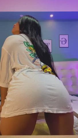 18 years old ass big ass eye contact latina long hair smile spanking teen gif