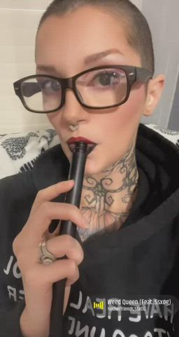 glasses green eyes piercing smoking gif