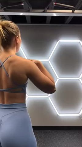 Showing off her perfect ass during back workout