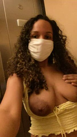 big tits boobs curly hair ebony elevator exhibitionist flashing outdoor public gif