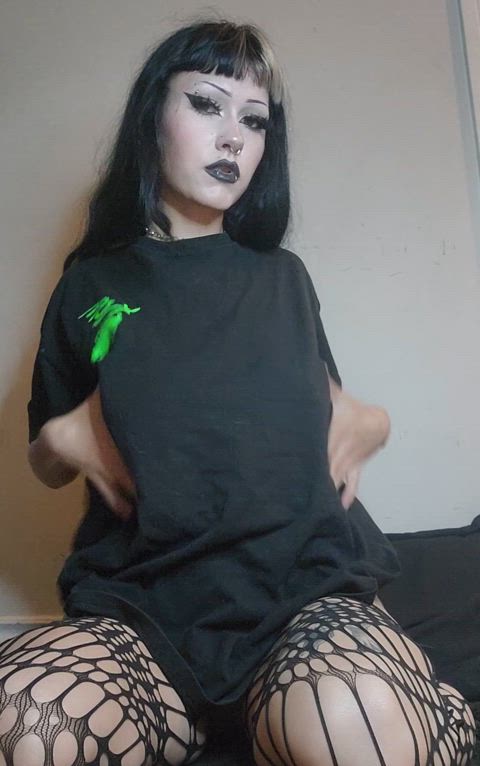 Little goth girl warming up her babies