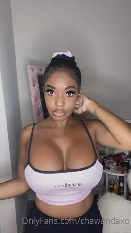 Big Tits Ebony Eye Contact Fake Tits Jiggling Lips Ponytail Smile Stripping Undressing