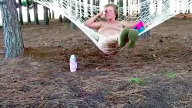 Mature female in hammock naked slow motiion